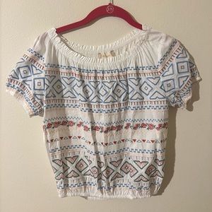 Altar’d state white and patterned shirt size S but can fit XS or M. Flattering!